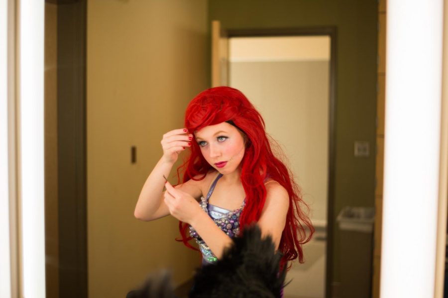 Annabelle McClelland prepares for her role as Ariel in The Little Mermaid.  The sophomore actress wowed audiences with her performances.