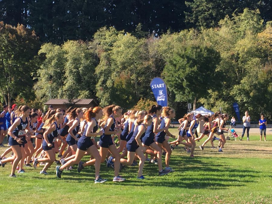 The girls team starting off at the sound of the gun. Junior Sam Prusse went on to win this race.