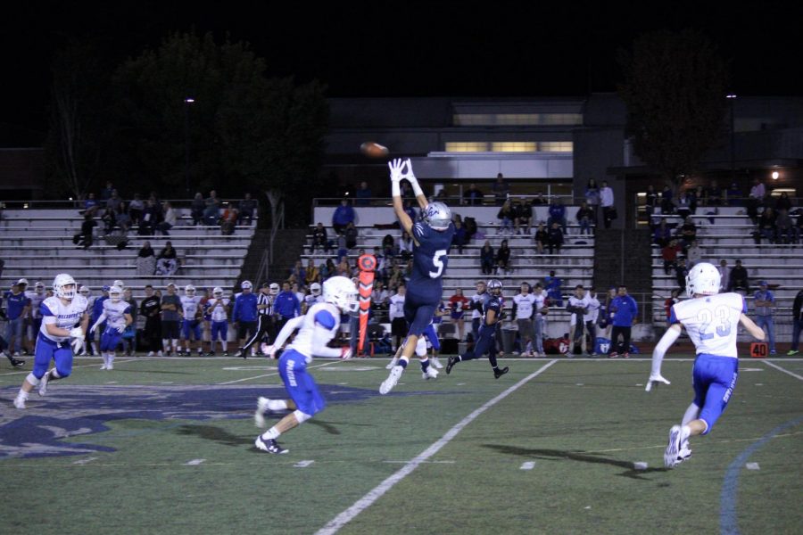 Zach Rivers, jumping up in the air for a spectacular catch.