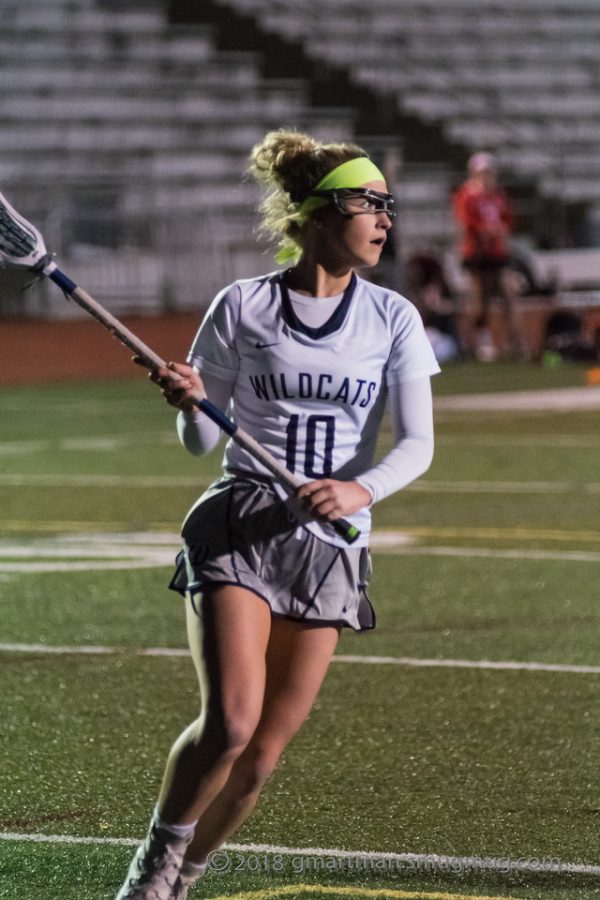 Pictured above is junior Kylie Hix during a lacrosse game last season. She is excited to be back in the sport and is looking forward to a fun season.