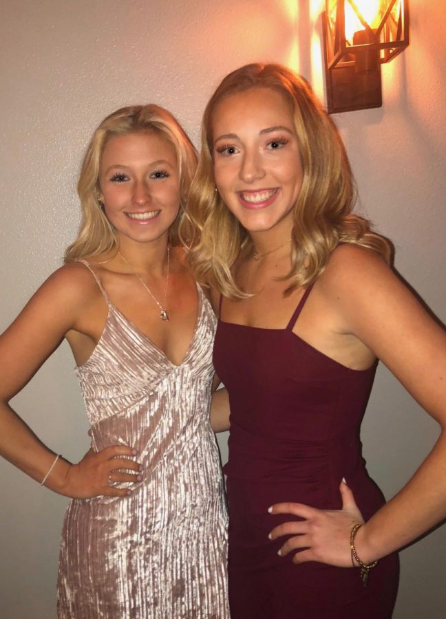 Pictured above is Kylie Hix (left) and Kayla Hieb (right) at Winter Formal this year. Hix is excited for prom next weekend and to be able to go with her friends.