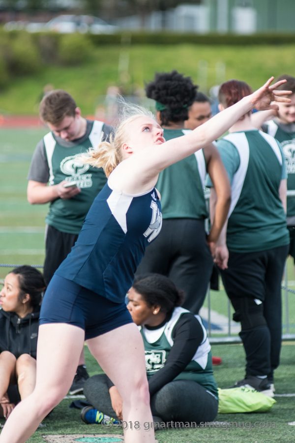 Lauren LaFreniere throwing shot put. She won the event on Wednesday at Scappoose. 
