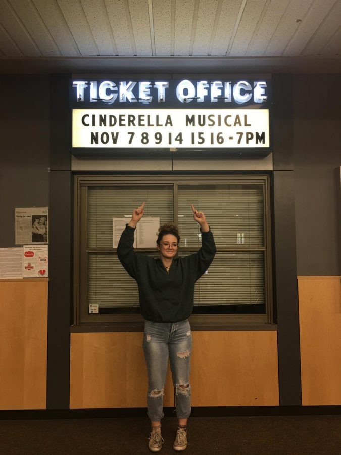 Pictured above is ensemble member Kate Hedgepeth presenting the showtimes for this falls musical Cinderella.