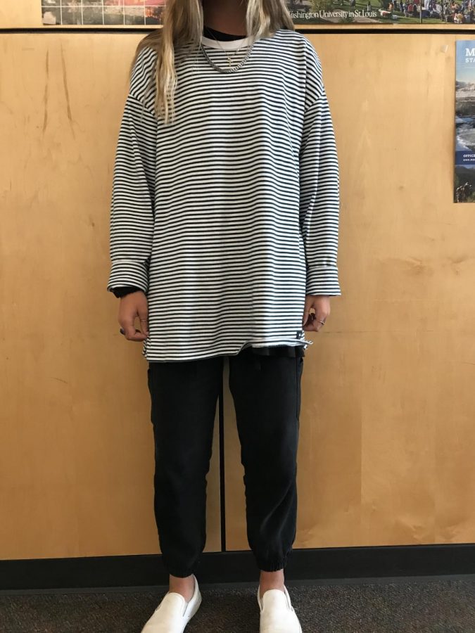 Here is Peyton Timm in her infamous striped longsleeve and skater pants.