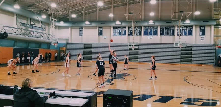 Emi Bishop wins the tipoff for the Wildcats. Wilsonville got the victory in all three of their games in the jamboree on Wednesday night.
