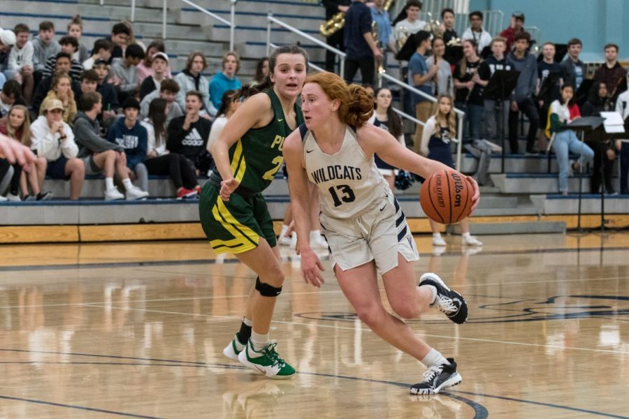 Junior guard Sydney Burns attacks the basket against Putnam. Burns led all scorers with 19 points on Friday night.