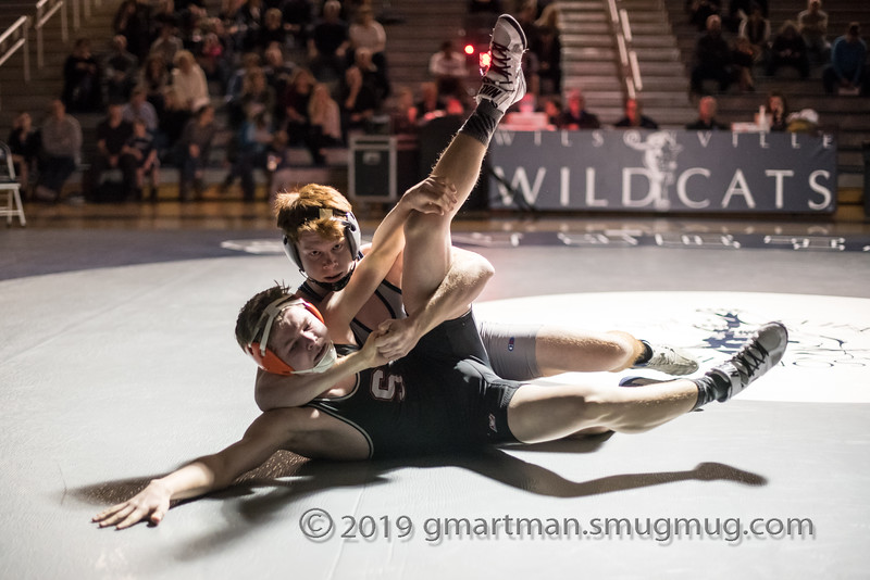 Tyson Resko with the upper hand in a wrestling match at Wilsonville High School.