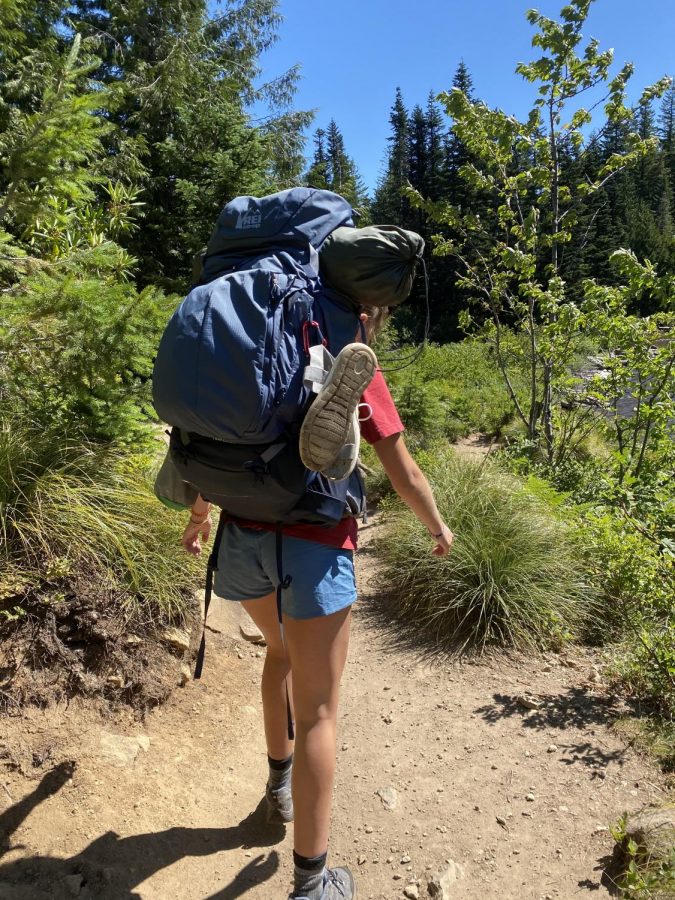 Junior Ellie Wettstein exploring Oregon on a hike in Mirror Lake. Students have been using hiking as a way of staying in touch while social distancing. 
