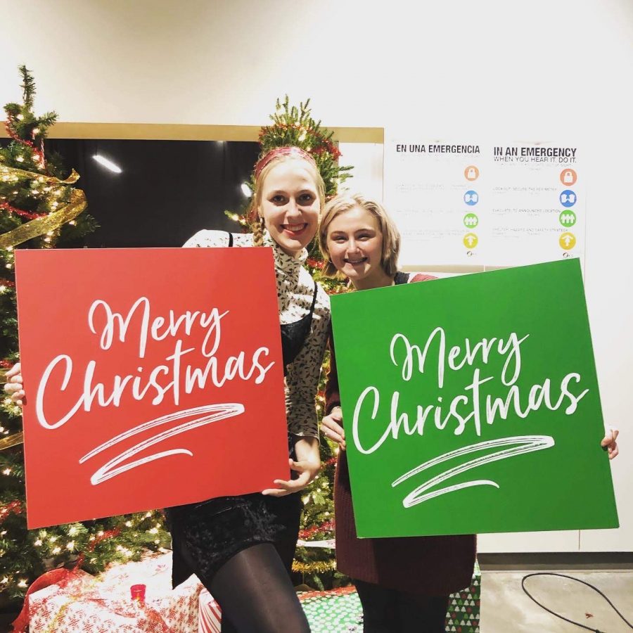Emi Bishop and Alix Hazapis celebrating the holidays last year before Covid-19