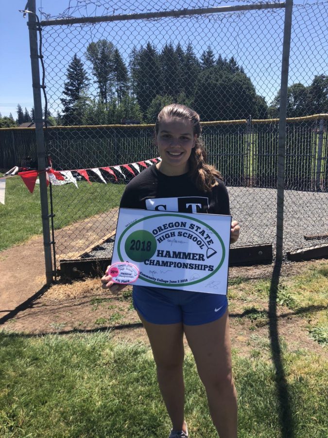 Senior, Maddy Jones showing off her athletic accomplishments at the 2018 state competition. Now Jones continues to pursue her dreams after signing to Notre Dame.  
