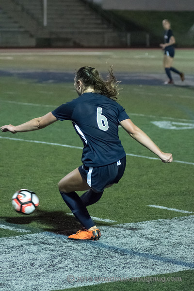 Senior Keira McNamee delivers a ball last season. This year she anchors the Wildcat defense.