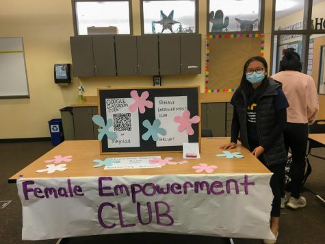 The Female Empowerment Club booth at the club fair! Clubs each had their own booth where they showcased their information and a description of what they do.
