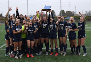 Wilsonville Girls Soccer hoisting the 5A state title. This came after their 4-2 win over La Salle. 