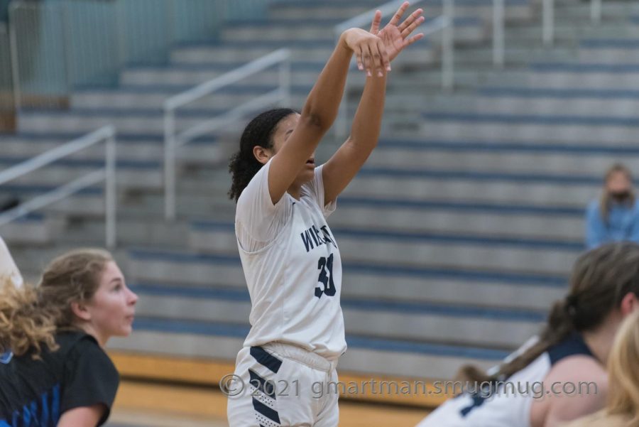 Sophomore Zoey Davis at the free throw line in a previous game v.s Churchill. Wilsonville won this game 47-39. 