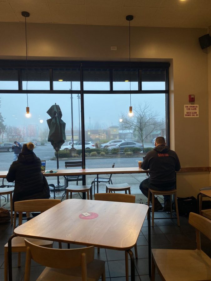Two local citizens getting work done at the Boones Ferry Starbucks. It was a foggy morning, perfect for a coffeebreak!