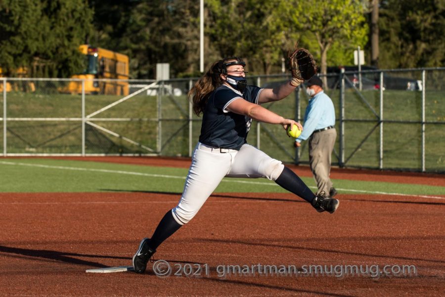 Maddie Erickson pitching in a home game. Erickson received Pitcher of the Year for the 2021 season. 