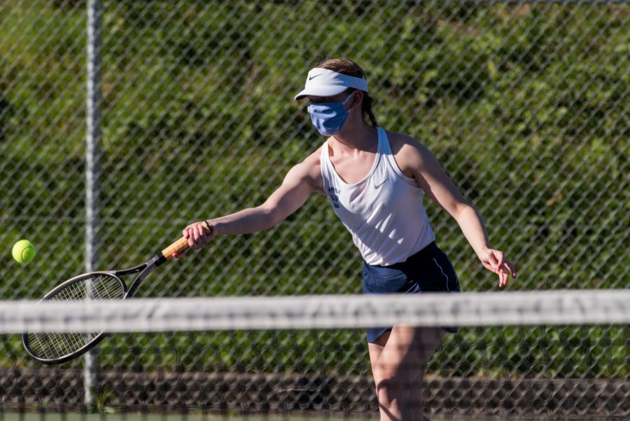 Current+senior+Rachel+Westing+hits+a+forehand+in+a+home+match+against+Hillsboro.+The+Cats+last+season+was+a+success%2C+and+they+hope+to+carry+this+into+this+years+season.