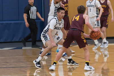 Maxim Wu plays fantastic defense in a 65-36 Wilsonville victory.