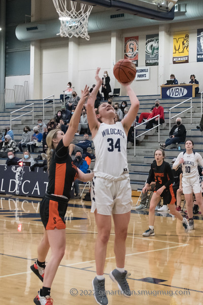 Freshman Payton Ratcliffe goes up for the bucket. Wilsonville beat Scappoose 54-22