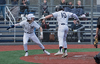 Seniors Cole Hubka and Max Bledy celebrating after a Bledy inside-the-park home run. The Cats won 10-1.