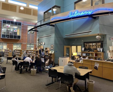 Students sit in the school library before class. The library is a great place for students to come study,  learn, and of course, read.