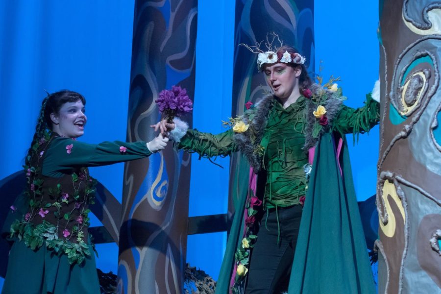 Courtney Lawrence as Puck and Rorey Dederian as Oberon as Puck hands Oberon the magical flowers to cast a spell on Titania. The performance captivated the audience. 