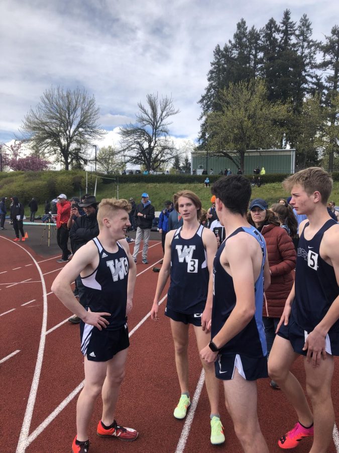 Nathan Wilde and Benjamin McClelland talking with their competitors after their race. Ben and Nathan both had strong races and ran in the fastest heat of the invitational. 