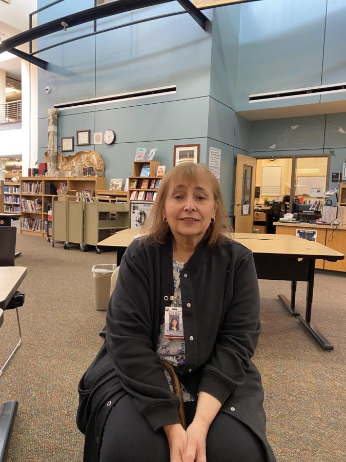 Ms. Peake in the library. She is excited to start some new hobbies. 