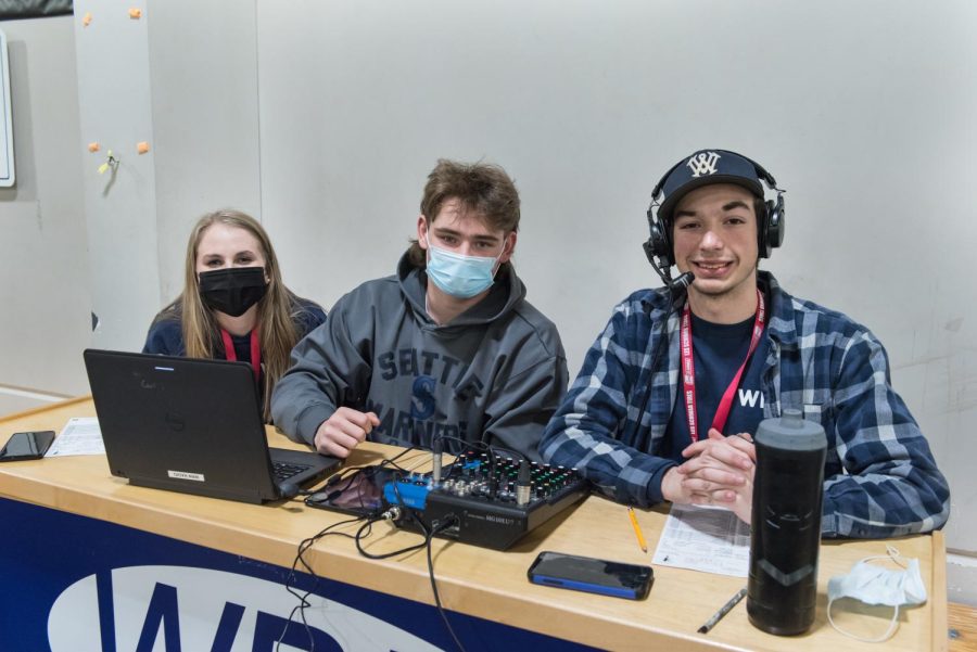 Elizabeth+Harris%2C+Mason+Seal%2C+and+Anthony+Saccente+all+help+broadcast+a+Wilsonville+girls+basketball+game+during+the+winter.