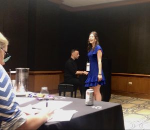 Author Claudia Molatore sings in front of a panel of judges for the CS Music Competition in Chicago. Although, this was not an actual college audition, this is what the experience will look like for many students. 