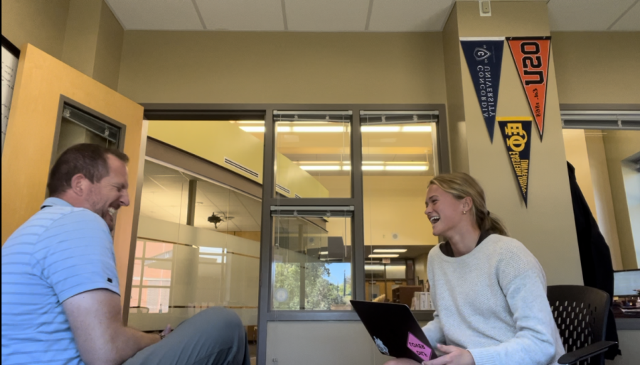 New Athletic Director, Josh Davis, and Alexis McIlmoil having a laugh in the office. McIlmoil was mid-interview when photo was taken. Photo provided by author. 