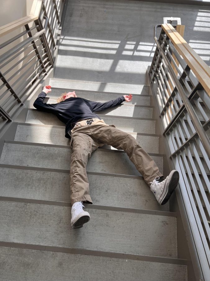 Rowan Farrell tries to beat the battle with the stairs at Wilsonville High School.