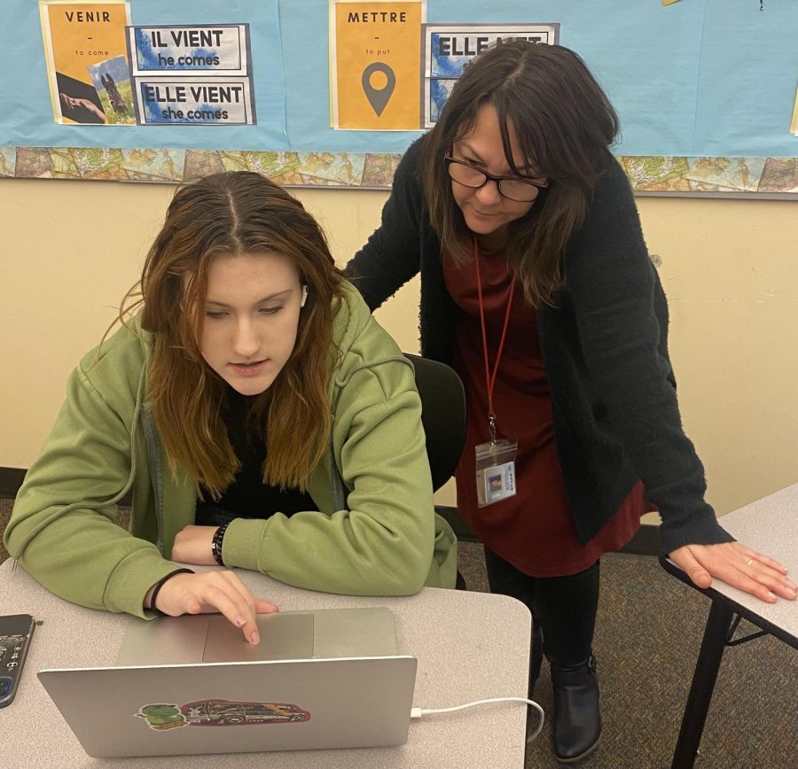 Ellorian Hulstine, sophomore, receives help from her french teacher. French is one of her favorite class periods!
