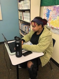 Paige Timmons, a Junior, works intently on her AP World essay. 