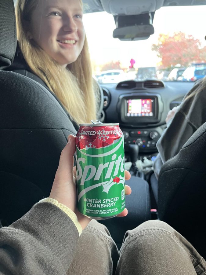 A sprite cranberry in the hand of a sprite cranberry fanatic as she huddles in the back of her friends car in the morning before school.
The taste of the holiday season. The excitement around the return of sprite cranberry is apparent. Sitting in warm cars in the morning before school and sipping on sweet sprite is becoming tradition. 
