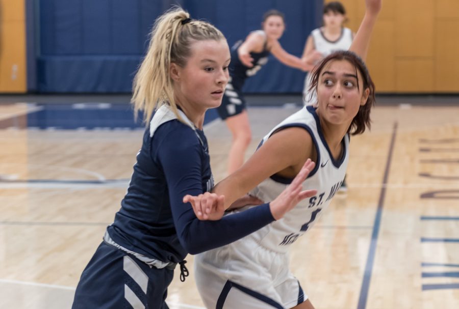 Senior Faith Nashif guards a St. Marys player during the jamboree. Nashif the only Senior looks to lead Wilsonville to the playoffs in back to back years.