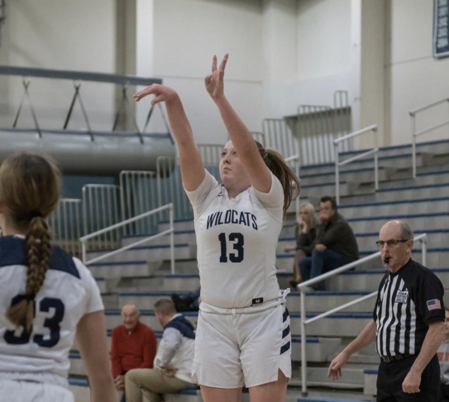 Junior Maddie Holly going for a three. Wilsonville wins 71-32.