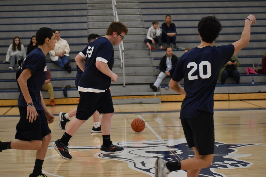Senior Bryce Barham dribbling the ball down the court during the game. Wilsonville was playing Westview. 