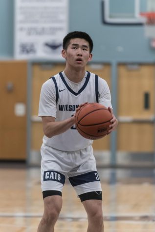 Senior Maxim Wu shoots a free throw. The Cats will face Putnam on Friday.
