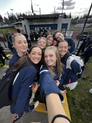 Wilsonville girls varsity track poses for a selfie. They were excited to be able to compete in their first track meet! 
