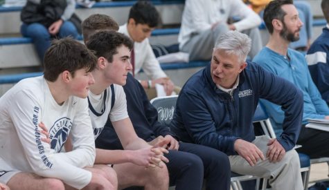 Wilsonville Head Coach Chris Roche gives some advice to Juniors Kallen Gutridge and Kyle Counts. Wilsonville faces Crescent Valley tonight at 8:15 PM.