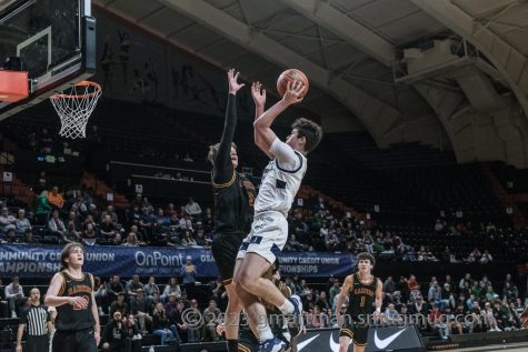 Junior Guard Kallen Gutridge goes up for a tough layup in the SF vs Crescent Valley. Wilsonville would advance to the State Championship to face Summit.