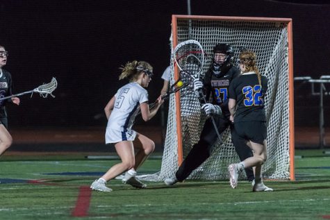 Some of the wildcat girls lacrosse players scoring against Newberg. The girls took home the win for both this game and the Central Catholic game.