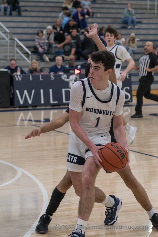 Kallen+Gutridge+drives+to+the+hoop+in+a+senior+night+game+against+Hillsboro.+Wilsonville+would+go+on+to+beat+Hillsboro+as+Gutridge+looks+to+lead+Wilsonville+to+another+state+title.