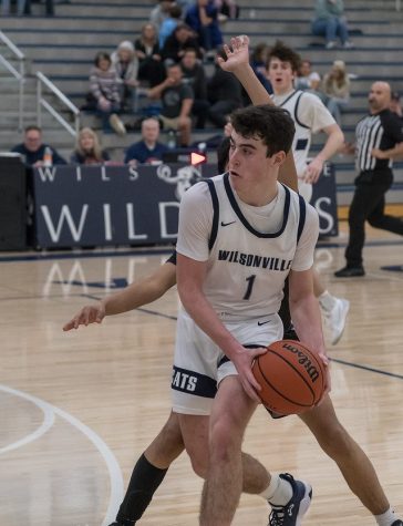 Kallen Gutridge drives to the hoop in a senior night game against Hillsboro. Wilsonville would go on to beat Hillsboro as Gutridge looks to lead Wilsonville to another state title.