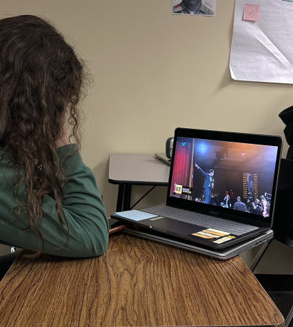 Grace Kelso watches the Oscars in class.  Students appreciated that the stars left the drama in the movies.