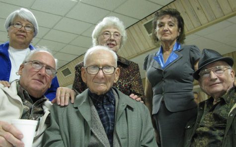 A group of seniors take an adorable selfie after they vote in their local election.