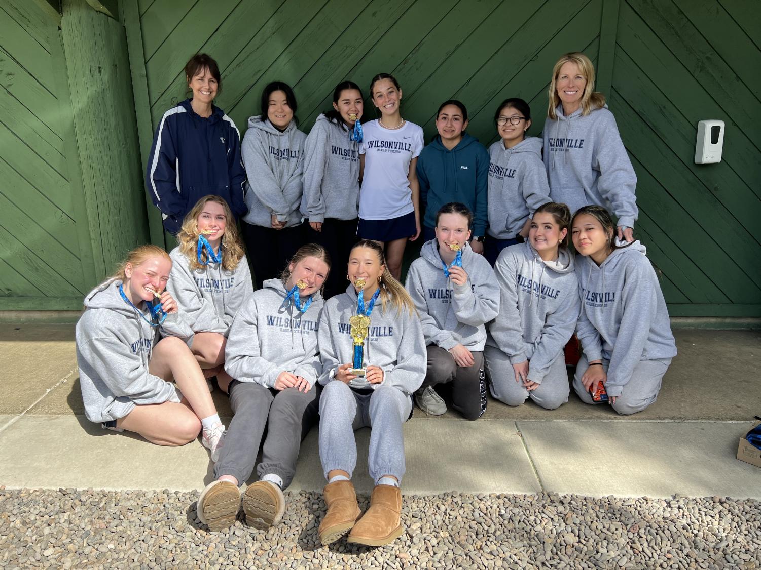 The girls tennis team after winning the Spartan Invitational. They are excited to keep competing for the rest of the season. 
