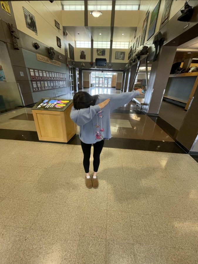 Raina Simonton (freshman) dabs her way into the next school year. She is anticipating the change to come with an overall positive attitude.