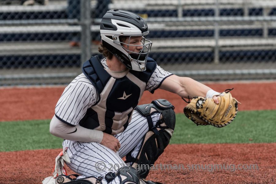 Mark Weipert makes a defensive play in a Wilsonville win over Milwaukee. Weipert was also a stud at the plate crushing an inside the park home run.